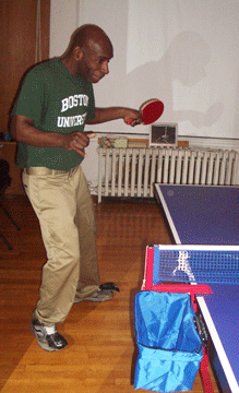 Harold Morris playing at table